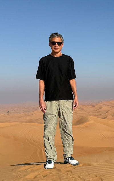 Art Lee hiking in the desert.