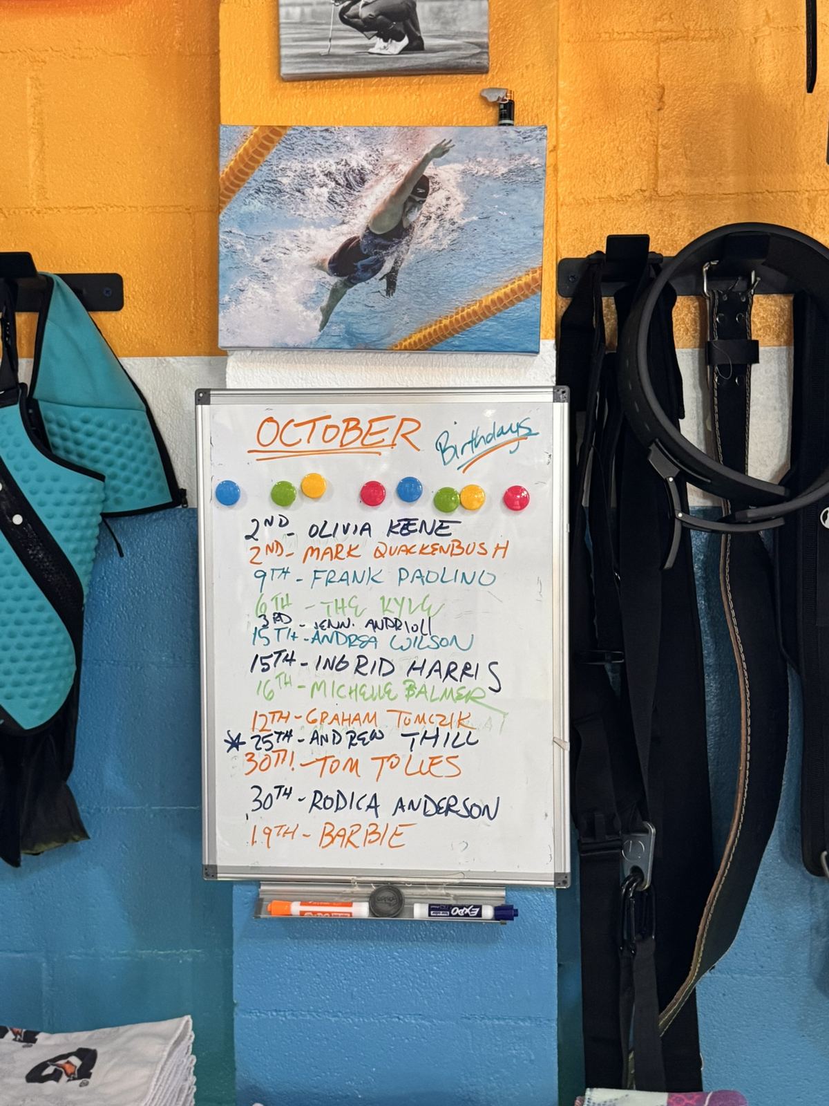 The October birthdays whiteboard at Lilley Fitness, with members' names and dates.